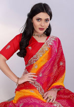 Load image into Gallery viewer, Pink Georgette Bandhani Print Saree