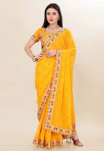 Load image into Gallery viewer, Yellow Georgette Bandhani Print Saree