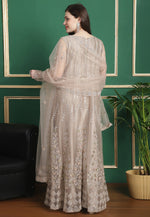 Load image into Gallery viewer, Beige Net Embroidered Anarkali Suit
