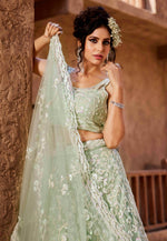 Load image into Gallery viewer, Pista Green Net Wedding Lehenga Choli
