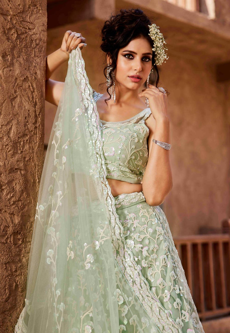 Pista Green Net Wedding Lehenga Choli