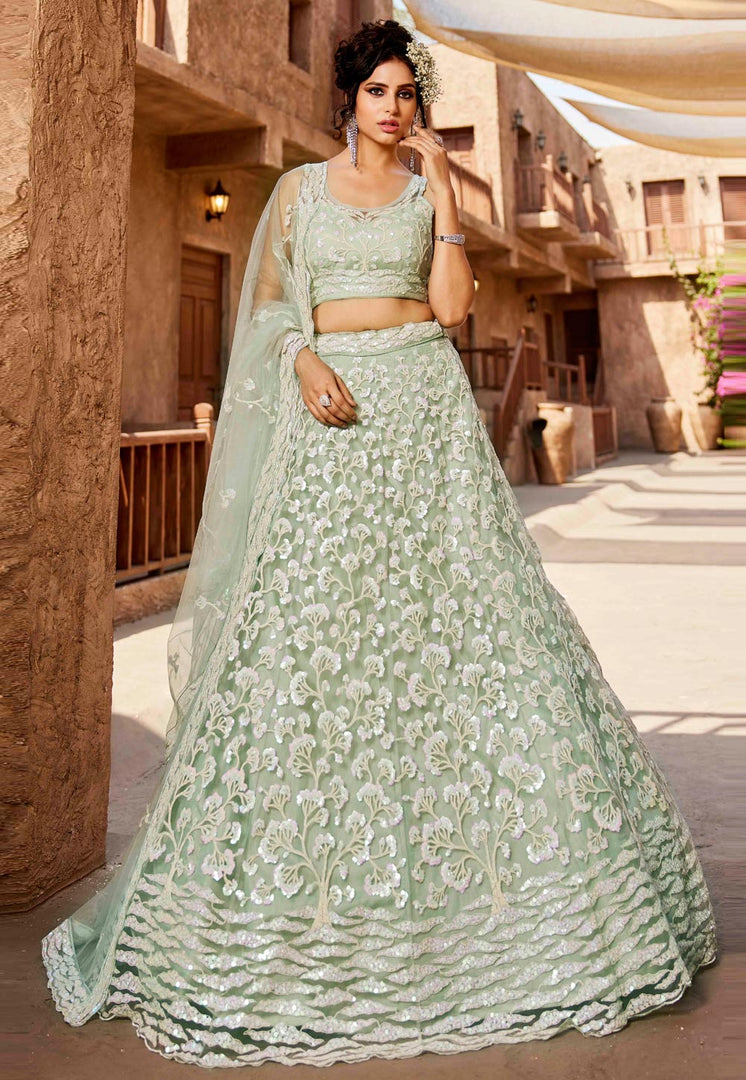 Pista Green Net Wedding Lehenga Choli