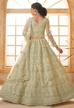 Load image into Gallery viewer, Pista Green Silk Net Lehenga Choli For Wedding
