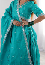 Load image into Gallery viewer, Teal Shimmer Lehenga Choli
