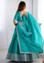 Load image into Gallery viewer, Teal Shimmer Lehenga Choli
